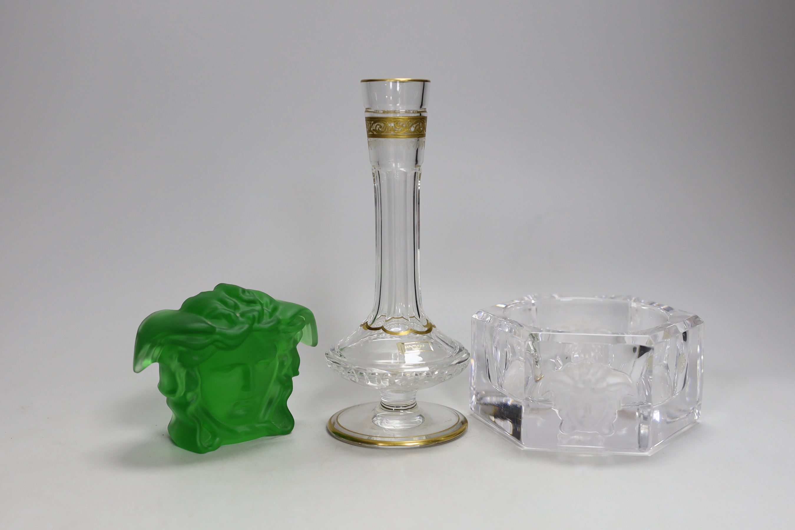 A Versace pressed green glass Medusa paperweight, a Versace ashtray and Asprey Saint Louis scent bottle